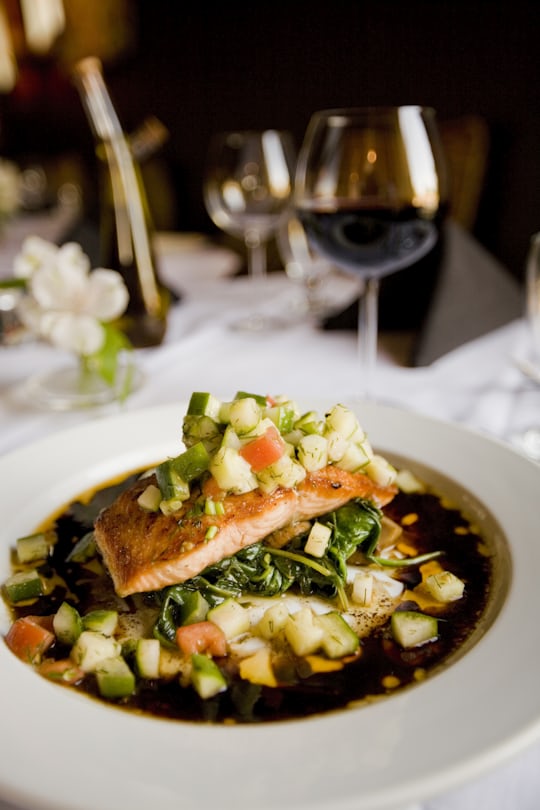 Grilled salmon with fresh vegetables on a plate